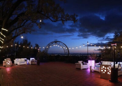Outdoor patio with arch in the evening at Padua Hills Theatre - Claremont, California